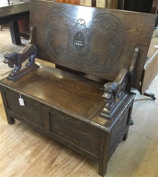 Carved oak monks bench